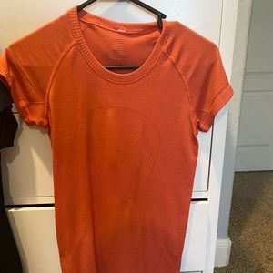 Orange lululemon swiftly tech